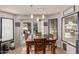 Bright breakfast nook with large windows and sliding glass door access to the patio at 7512 W Tonto Dr, Glendale, AZ 85308