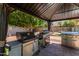 This gazebo features grills for outdoor cooking at 7512 W Tonto Dr, Glendale, AZ 85308