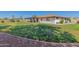 Wide-open backyard showing a well-manicured lawn and the home's exterior at 8767 W Villa Hermosa --, Peoria, AZ 85383
