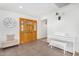 Bright foyer featuring tile floors, piano, and decorative front door at 8767 W Villa Hermosa --, Peoria, AZ 85383