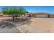 Charming single-story home with desert landscaping, an attached two-car garage and long driveway at 8767 W Villa Hermosa --, Peoria, AZ 85383