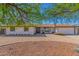 Charming single-story home featuring desert landscaping, and two car garage at 8767 W Villa Hermosa --, Peoria, AZ 85383