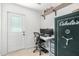Bright office area with dual monitors, a workstation, and a large Cabela's gun safe at 8767 W Villa Hermosa --, Peoria, AZ 85383