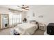 Serene bedroom with a large window, soft lighting, and decorative accents at 8787 E Mountain View Rd # 1029, Scottsdale, AZ 85258