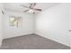 Bedroom with a window and ceiling fan at 9118 W Cameron Dr, Peoria, AZ 85345