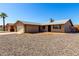 Single-story home with a two-car garage, desert landscape, and a neat, clean facade at 9118 W Cameron Dr, Peoria, AZ 85345
