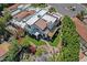 Remarkable aerial shot highlighting a home's meticulously landscaped backyard with fire pit and inviting outdoor spaces at 9241 S 50Th St, Phoenix, AZ 85044