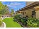 The expansive backyard features artificial turf, a grill, and an outdoor seating area at 9241 S 50Th St, Phoenix, AZ 85044