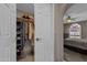 Organized walk-in closet with clothing racks and shelves, offering ample storage space at 9241 S 50Th St, Phoenix, AZ 85044