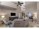 Comfortable living room with vaulted ceiling, clerestory windows, and open floor plan at 9241 S 50Th St, Phoenix, AZ 85044