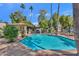 A beautifully designed community swimming pool with ample seating and a charming poolside cabana at 9241 S 50Th St, Phoenix, AZ 85044