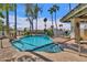 Beautiful swimming pool featuring desert landscaping, plenty of seating, and a relaxing atmosphere at 9241 S 50Th St, Phoenix, AZ 85044