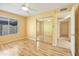 The bedroom, with its window and mirrored closet, offers a peaceful personal retreat at 9463 E Jenan Dr, Scottsdale, AZ 85260