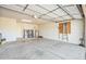 Spacious garage featuring a washer and dryer, water heater, and plenty of open space at 9463 E Jenan Dr, Scottsdale, AZ 85260