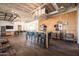 Spacious amenity center with tables, chairs, and kitchen area for gatherings and events at 9837 E Tiburon Ave, Mesa, AZ 85212