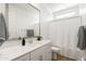 Bright bathroom features a quartz countertop, large mirror, and modern fixtures at 9837 E Tiburon Ave, Mesa, AZ 85212