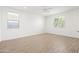 Bright bedroom with wood floors and large windows at 9837 E Tiburon Ave, Mesa, AZ 85212