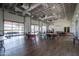 Expansive event space with large glass doors and multiple tables and chairs at 9837 E Tiburon Ave, Mesa, AZ 85212