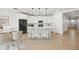 Bright eat-in kitchen with quartz countertops, center island and modern pendant lighting at 9837 E Tiburon Ave, Mesa, AZ 85212