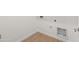 Practical laundry room with wood-look floors features utility hook-ups at 9837 E Tiburon Ave, Mesa, AZ 85212