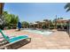 A spa with shaded lounge chairs and umbrellas offers ultimate relaxation and privacy at 9837 E Tiburon Ave, Mesa, AZ 85212
