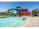 Resort-style swimming pool featuring thrilling water slides for residents to enjoy at 9837 E Tiburon Ave, Mesa, AZ 85212