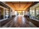 Inviting walkway with decorative lighting, planters and multiple glass doorways for convenient access at 9837 E Tiburon Ave, Mesa, AZ 85212