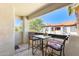 Balcony with a bistro set, offering nice views of the surrounding area at 9990 N Scottsdale Rd # 2042, Paradise Valley, AZ 85253