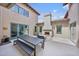 Beautiful courtyard with an outdoor fireplace, seating area and desert landscaping at 10182 E Gilded Perch Dr, Scottsdale, AZ 85255