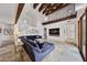 Bright and spacious living room featuring high ceilings, exposed beams, and comfortable seating at 10182 E Gilded Perch Dr, Scottsdale, AZ 85255