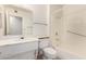 Well-lit bathroom featuring white vanity, tub-shower combo, and neutral flooring at 10401 N 108Th Ave, Sun City, AZ 85351