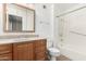 Neutral bathroom featuring a vanity with a mirrored cabinet and a shower-tub combo at 10401 N 108Th Ave, Sun City, AZ 85351