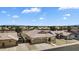 Aerial view of the home with solar panels, desert landscaping, and a neighborhood view at 10809 W Harmony Ln, Peoria, AZ 85373