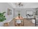 Dining area with a modern table, chairs, and natural lighting at 10809 W Harmony Ln, Peoria, AZ 85373