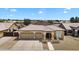 Aerial view of a well-maintained home featuring desert landscaping and tile roof at 10809 W Harmony Ln, Peoria, AZ 85373