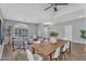 Open-concept living space combining dining and living areas with modern style at 10809 W Harmony Ln, Peoria, AZ 85373