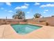 Sparkling swimming pool in a secluded backyard setting, designed for ultimate relaxation and enjoyment at 10809 W Harmony Ln, Peoria, AZ 85373