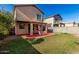 A spacious backyard and patio area offer a perfect blend of outdoor living and relaxation at 11429 W Yavapai St, Avondale, AZ 85323