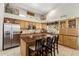 Well-equipped kitchen with stainless steel appliances, a central island, and plenty of storage space at 1181 N Dustin Ln, Chandler, AZ 85226