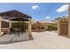 Backyard patio with fireplace and pergola, perfect for outdoor entertaining at 1181 N Dustin Ln, Chandler, AZ 85226