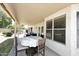 Spacious covered patio with outdoor seating, perfect for enjoying the landscaped backyard and outdoor fountain at 1212 W Vera Ln, Tempe, AZ 85284