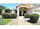 Welcoming facade of a home boasting lush landscaping and a charming entryway at 1212 W Vera Ln, Tempe, AZ 85284
