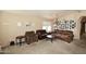 Comfortable living room featuring plenty of seating, neutral walls, and ample natural light creating a relaxing atmosphere at 1212 W Vera Ln, Tempe, AZ 85284