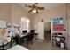 Bright office with a vaulted ceiling, offering ample workspace and natural light for productivity at 1212 W Vera Ln, Tempe, AZ 85284