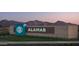 Alamar community entrance sign with mountain views and lush landscaping at 12708 W Corona Ave, Avondale, AZ 85323