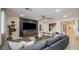 Comfortable living room with contemporary decor, ceiling fan, and a spacious layout at 12708 W Corona Ave, Avondale, AZ 85323
