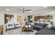 Open-concept living space with modern decor flowing seamlessly into the kitchen area at 12708 W Corona Ave, Avondale, AZ 85323