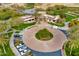 Overhead view of a modern building with palm trees, parking, and well-manicured landscaping at 12972 W Kokopelli Dr, Peoria, AZ 85383