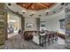 Beautifully designed clubhouse lounge area with stone accents, modern furnishings, and television at 12972 W Kokopelli Dr, Peoria, AZ 85383