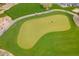 Beautiful green golf course putting green on a sunny day at 12972 W Kokopelli Dr, Peoria, AZ 85383